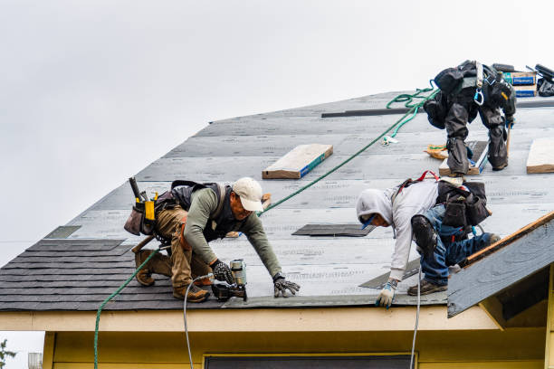 Professional Roofing technician working in White, SD